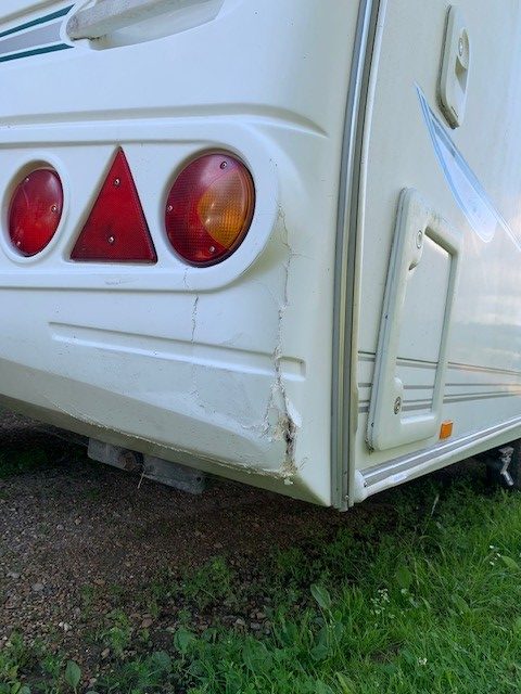Damage to caravan fibreglass rear panel 