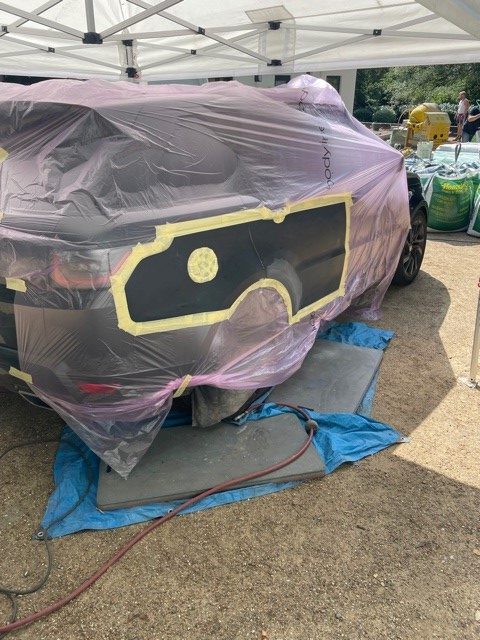 Auto body repairs being carried out on a car