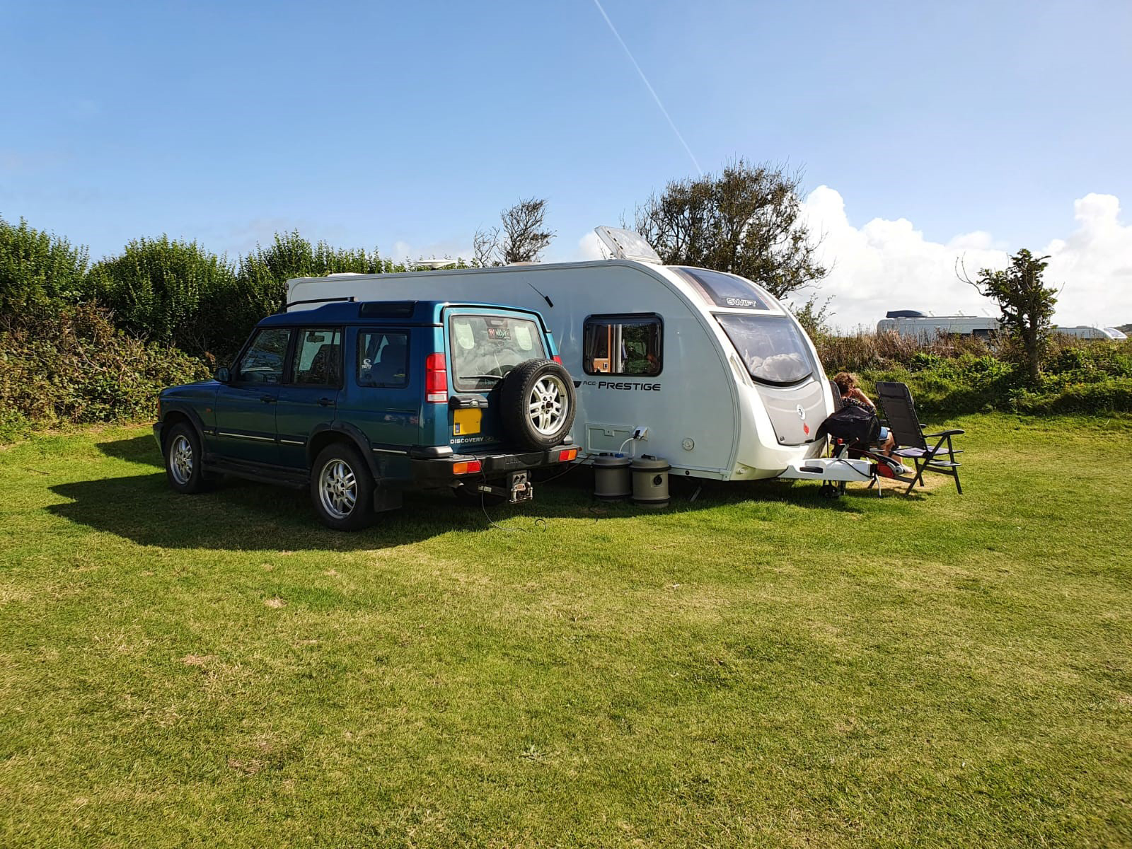 relaxing with touring caravan after caravan body repair